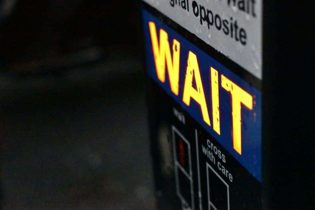 Crosswalk WAIT sign photo